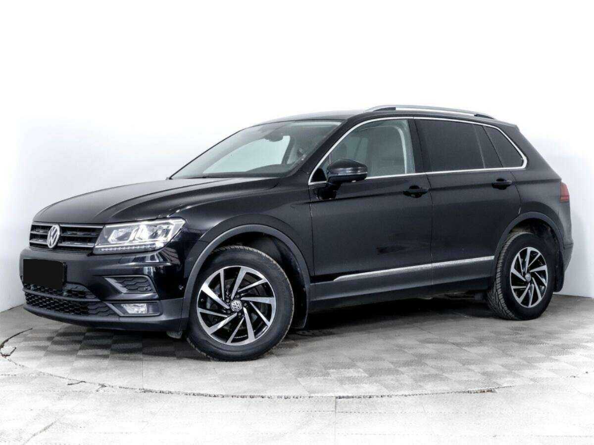 Купить Volkswagen Tiguan с пробегом. Посмотреть фото