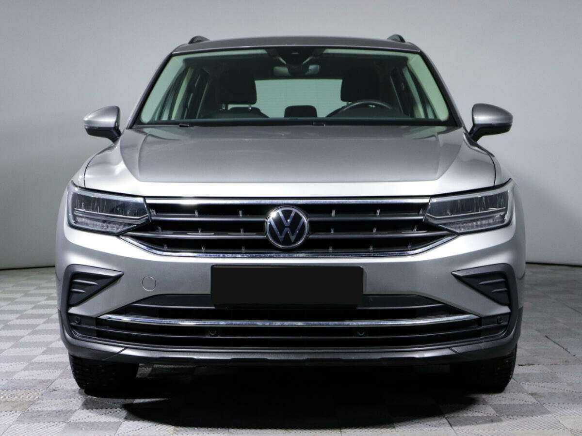 Купить Volkswagen Tiguan с пробегом. Посмотреть фото