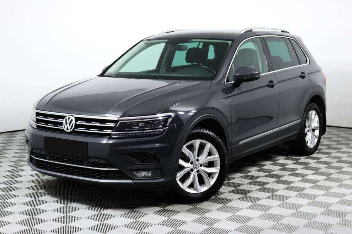 Купить Volkswagen Tiguan с пробегом. Посмотреть фото
