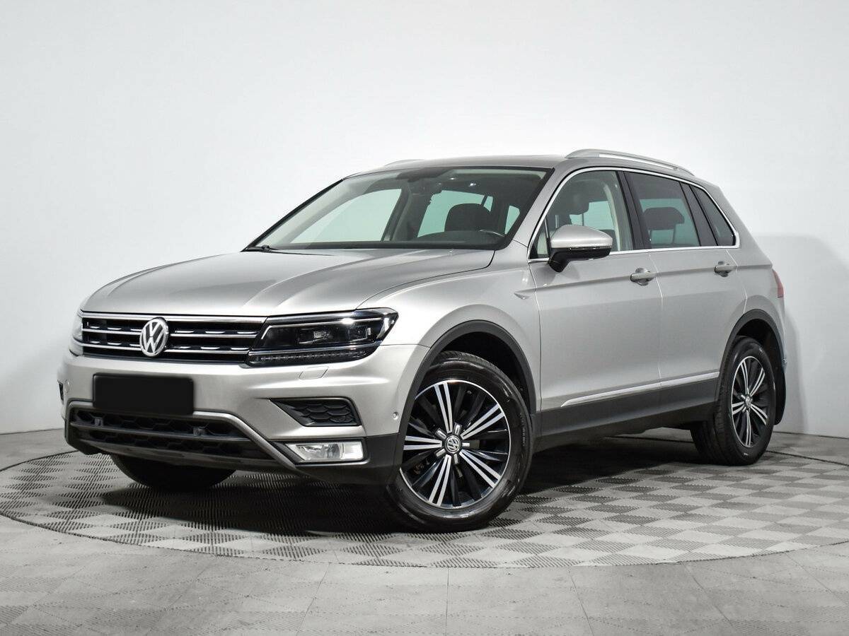 Купить Volkswagen Tiguan с пробегом. Посмотреть фото