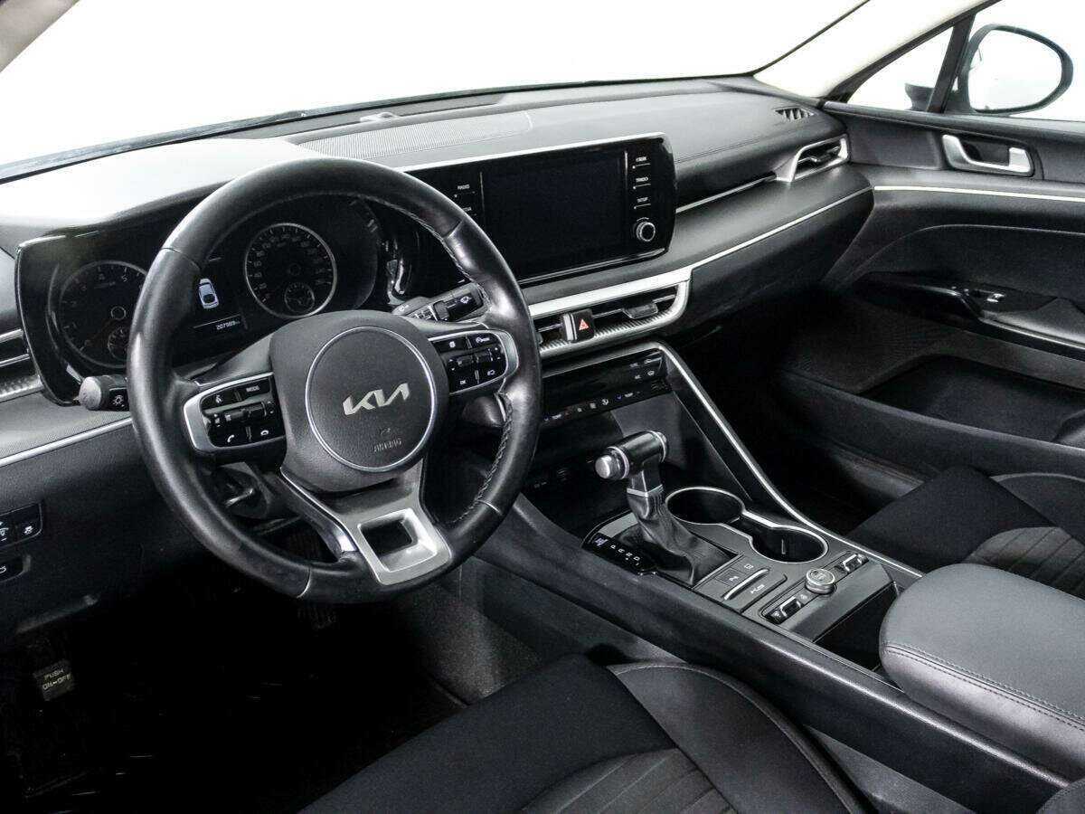 Купить Kia K5 с пробегом. Фото: #8