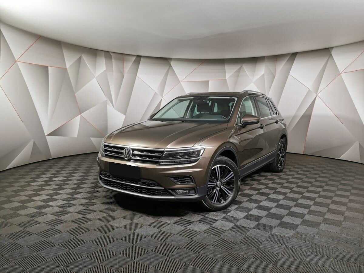 Купить Volkswagen Tiguan с пробегом. Посмотреть фото