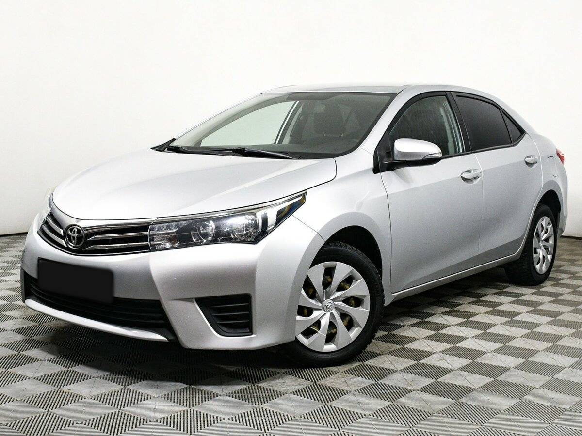 Купить Toyota Corolla с пробегом. Посмотреть фото