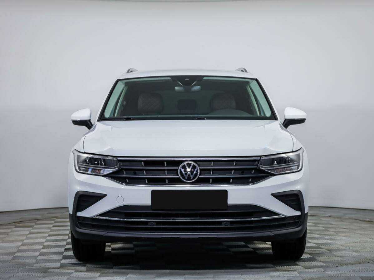 Купить Volkswagen Tiguan с пробегом. Посмотреть фото