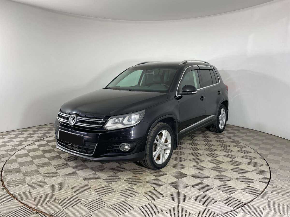 Купить Volkswagen Tiguan с пробегом. Посмотреть фото
