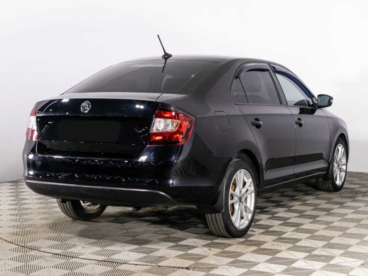 Купить Skoda Rapid с пробегом. Фото: #4