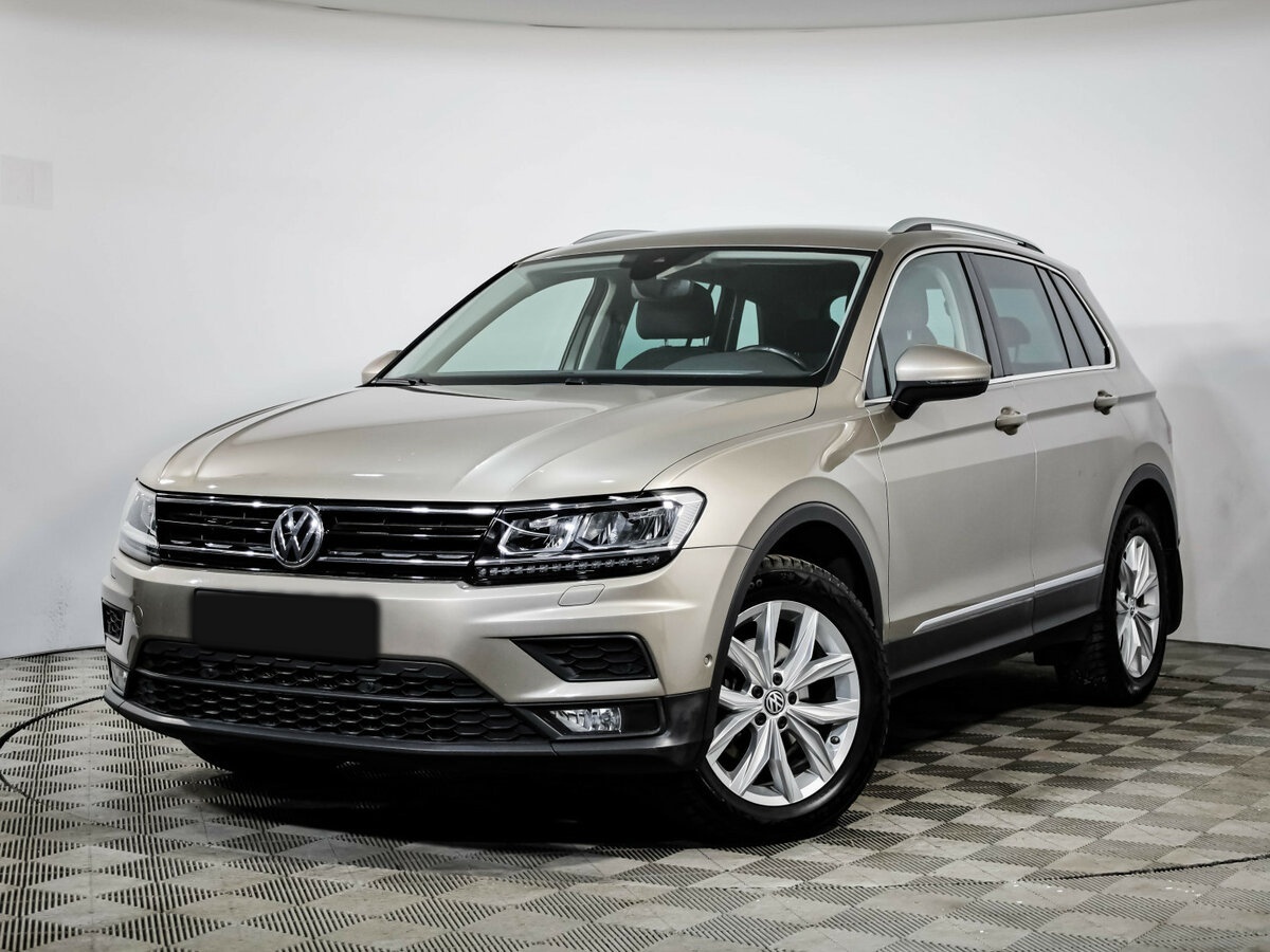 Купить Volkswagen Tiguan с пробегом. Посмотреть фото