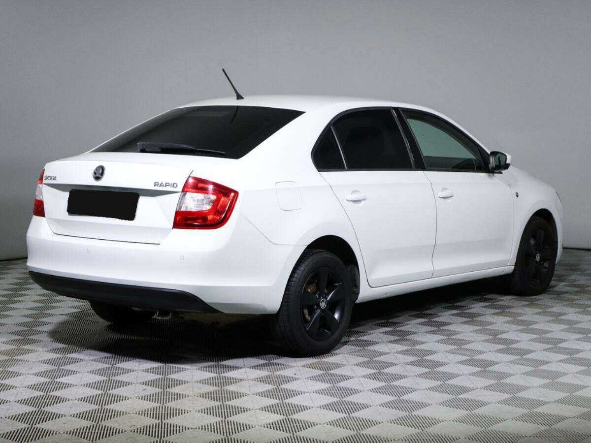 Купить Skoda Rapid с пробегом. Фото: #4