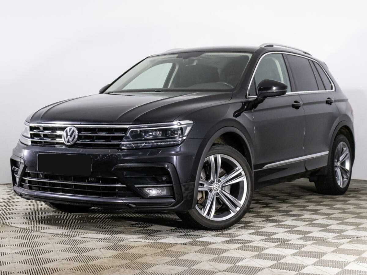 Купить Volkswagen Tiguan с пробегом. Посмотреть фото