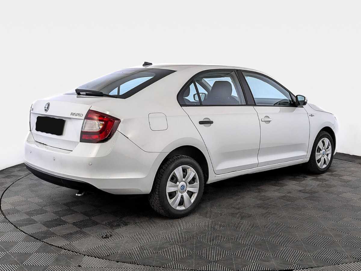 Купить Skoda Rapid с пробегом. Фото: #4