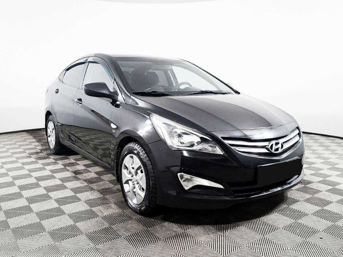 Купить Hyundai Solaris с пробегом. Фото: #2