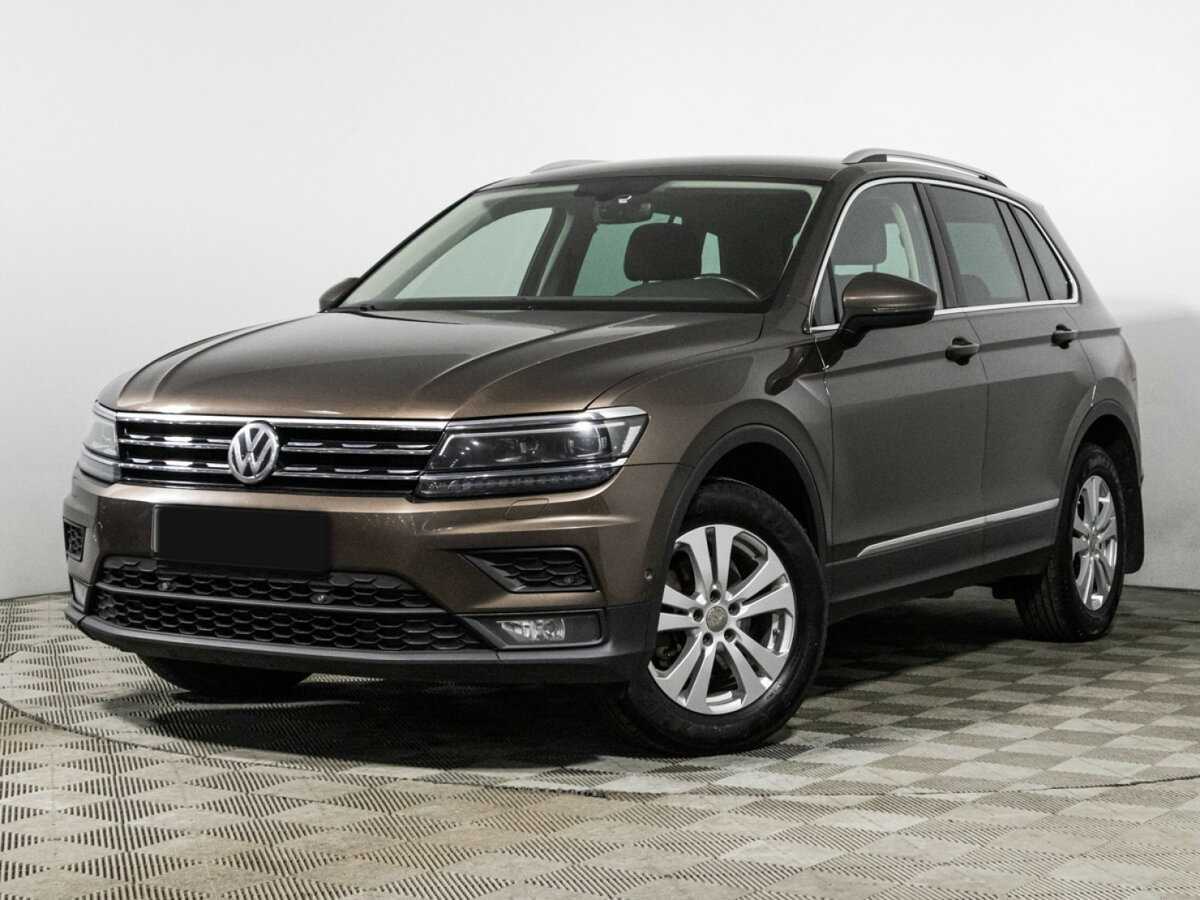 Купить Volkswagen Tiguan с пробегом. Посмотреть фото
