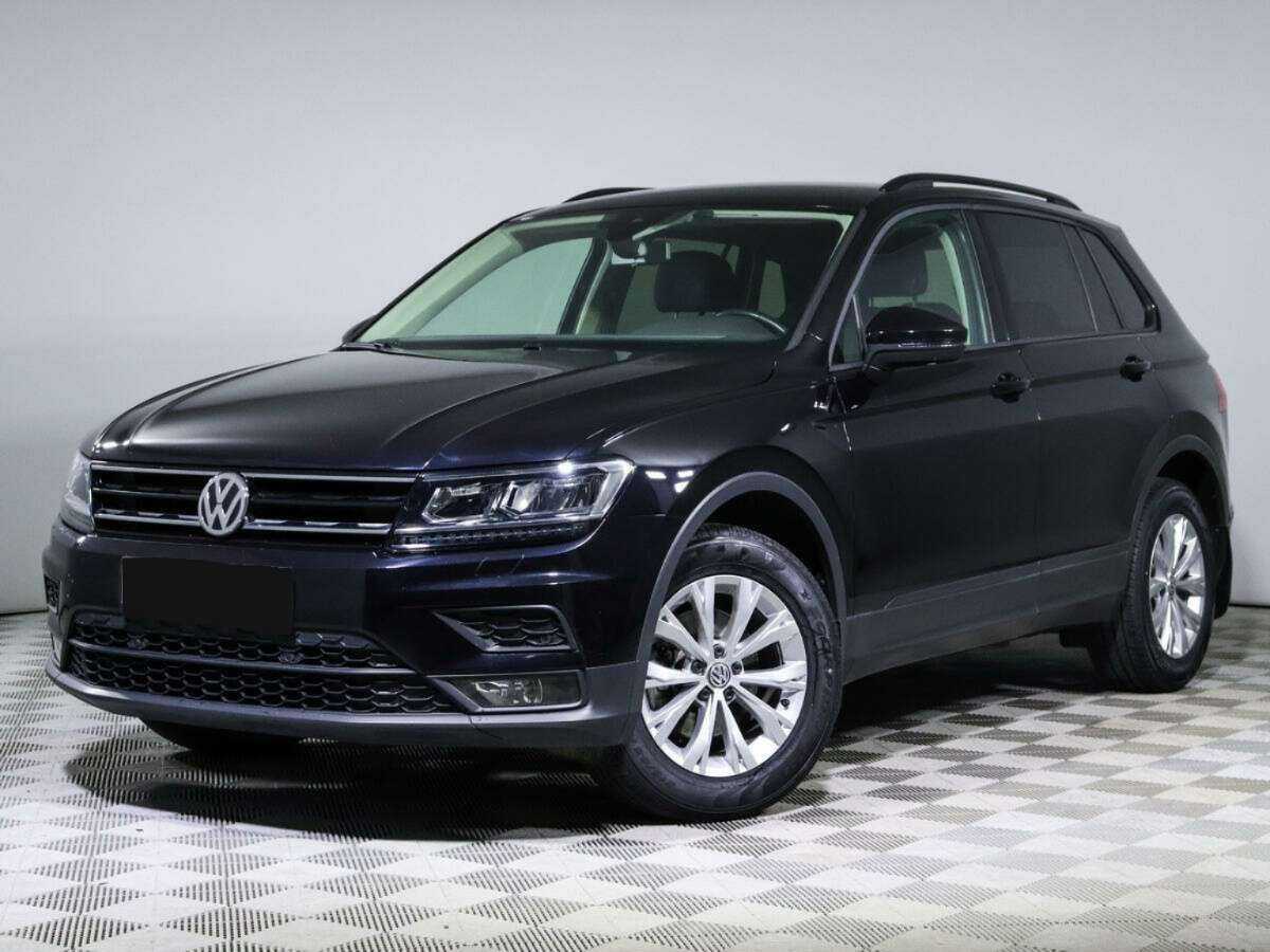 Купить Volkswagen Tiguan с пробегом. Посмотреть фото