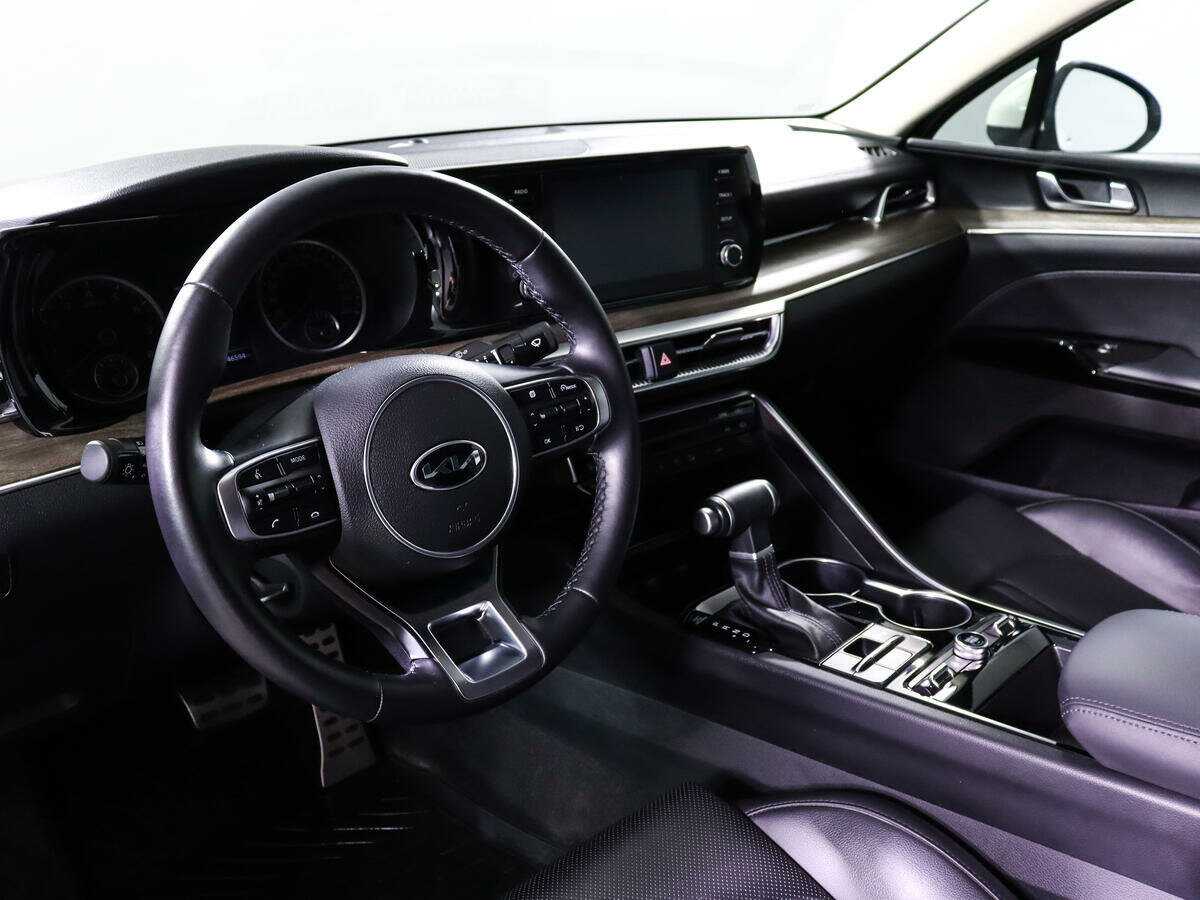 Купить Kia K5 с пробегом. Фото: #11