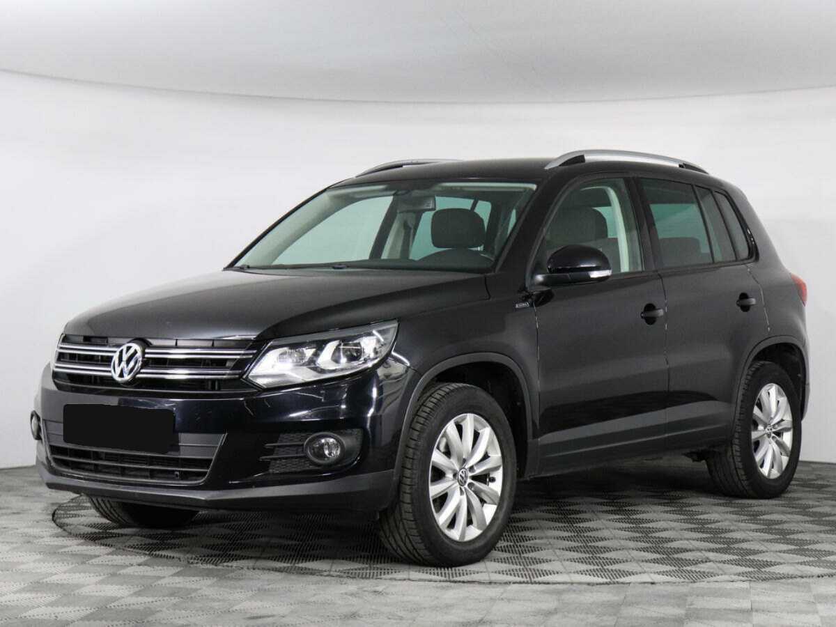 Купить Volkswagen Tiguan с пробегом. Посмотреть фото