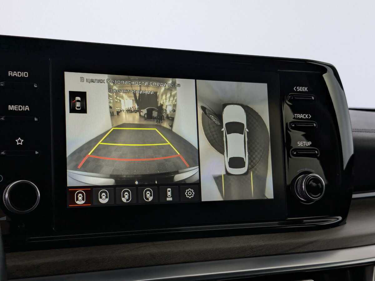 Купить Kia K5 с пробегом. Фото: #22