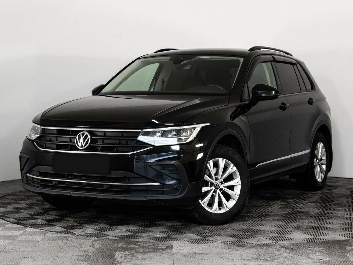Купить Volkswagen Tiguan с пробегом. Посмотреть фото
