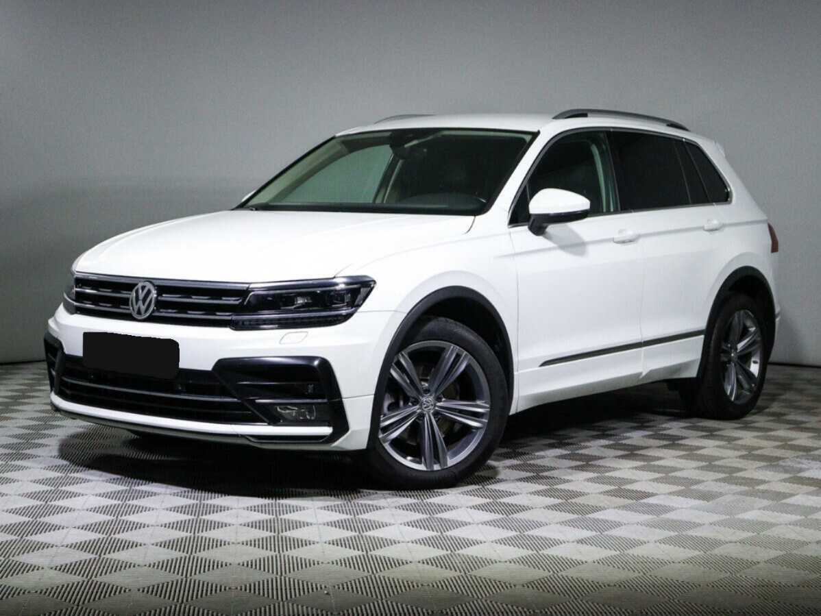 Купить Volkswagen Tiguan с пробегом. Посмотреть фото