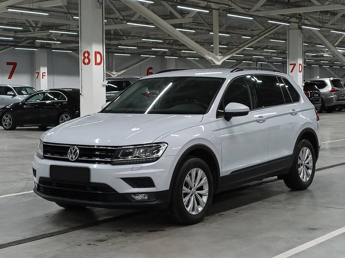Купить Volkswagen Tiguan с пробегом. Посмотреть фото