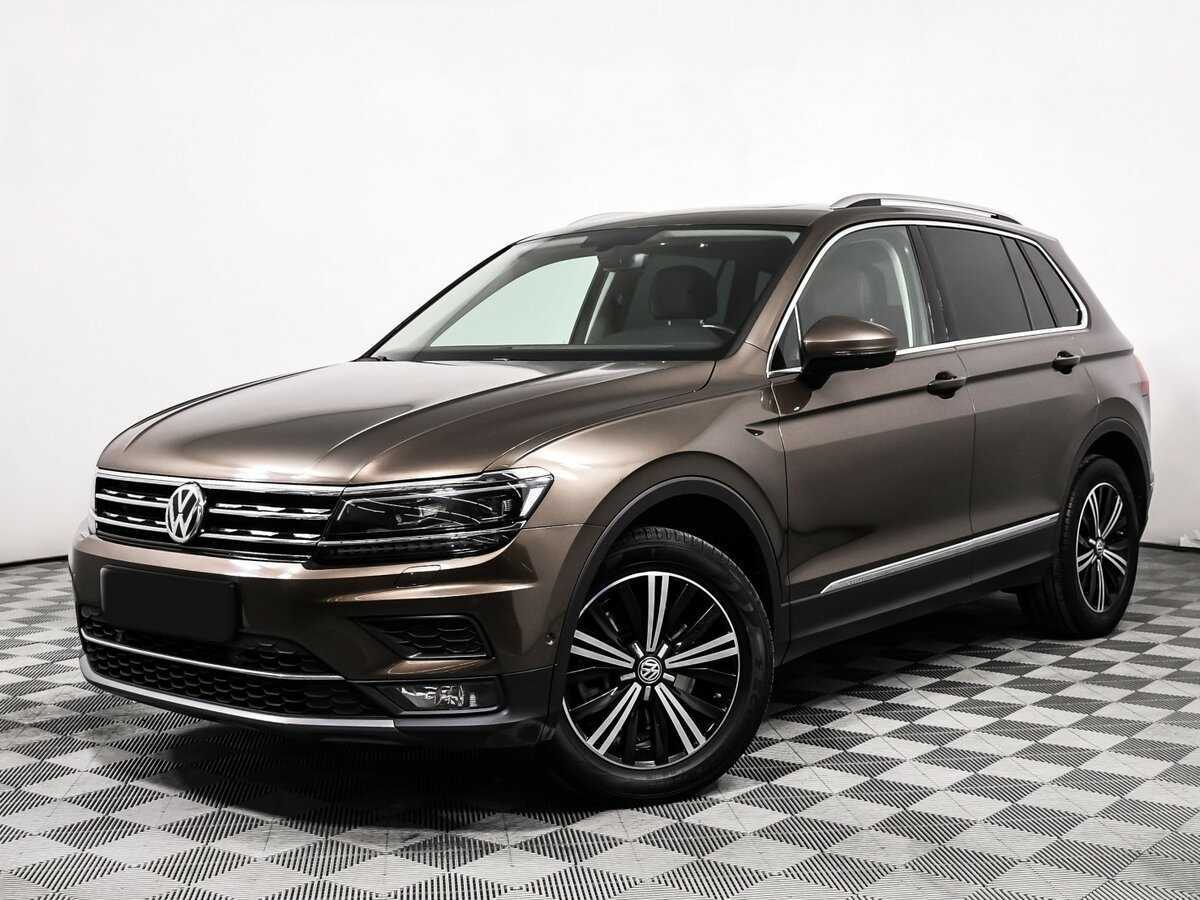 Купить Volkswagen Tiguan с пробегом. Посмотреть фото