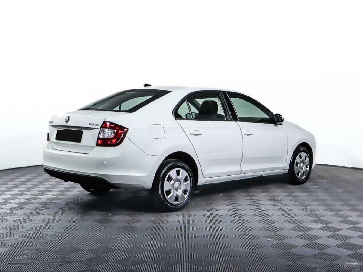 Купить Skoda Rapid с пробегом. Фото: #4