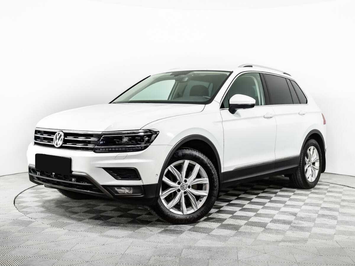 Купить Volkswagen Tiguan с пробегом. Посмотреть фото