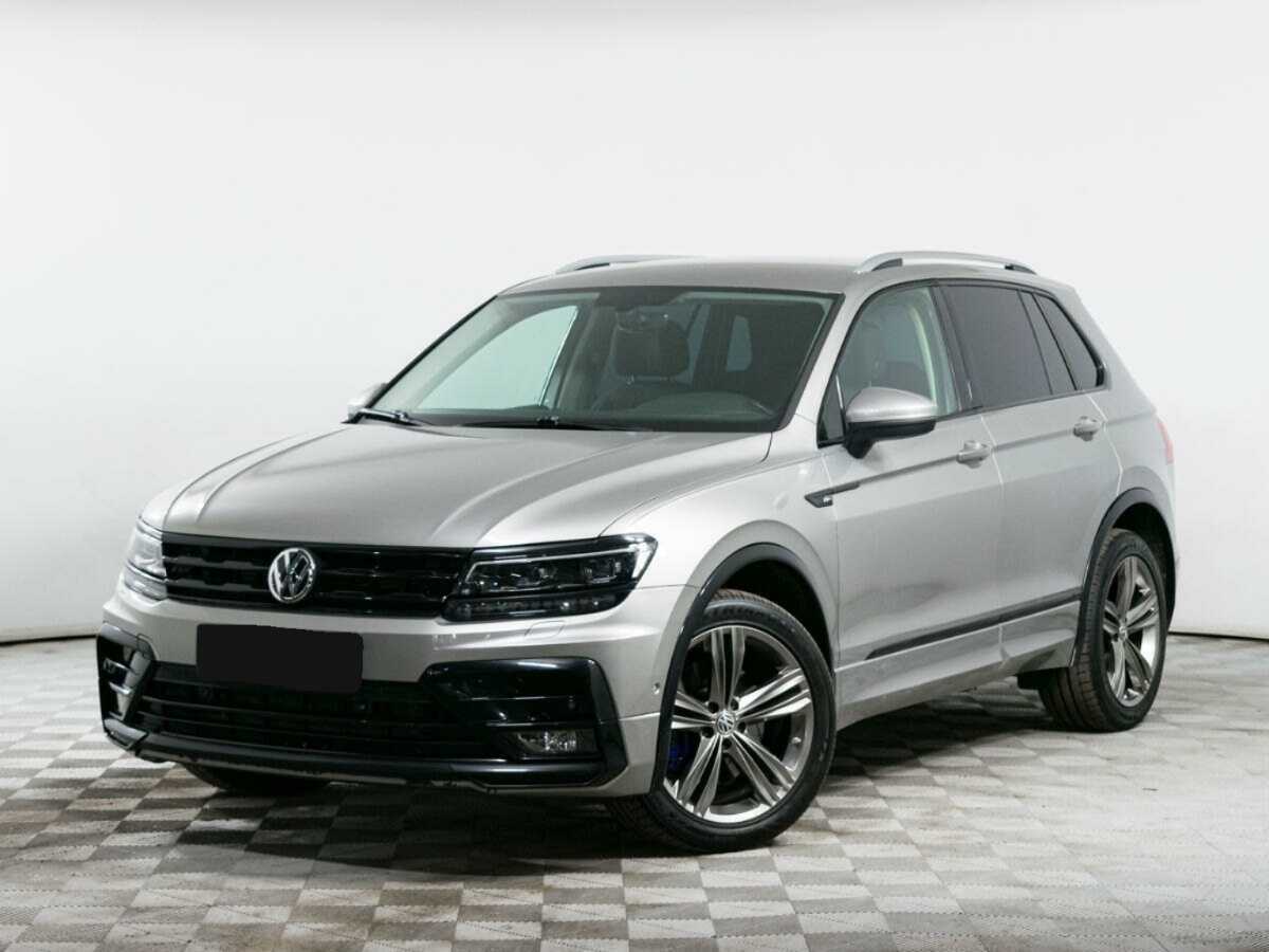 Купить Volkswagen Tiguan с пробегом. Посмотреть фото