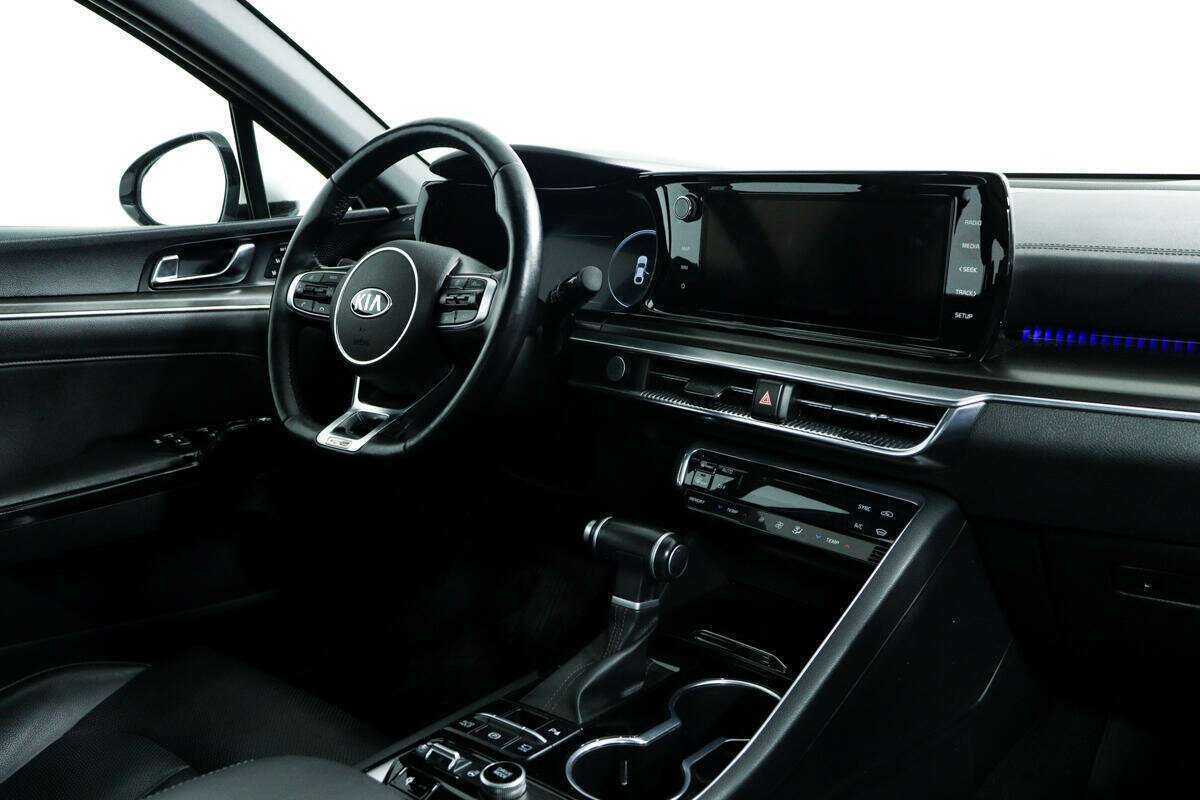 Купить Kia K5 с пробегом. Фото: #8