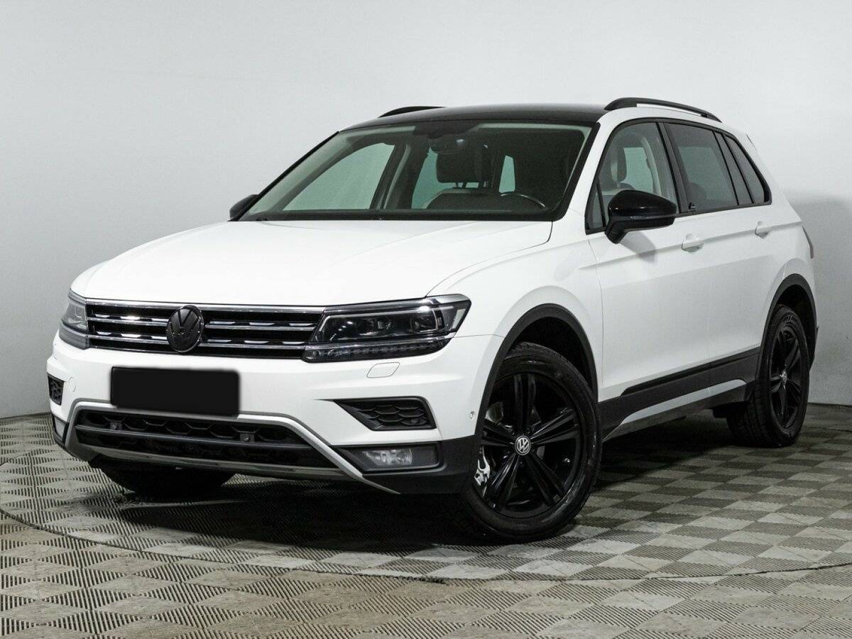 Купить Volkswagen Tiguan с пробегом. Посмотреть фото