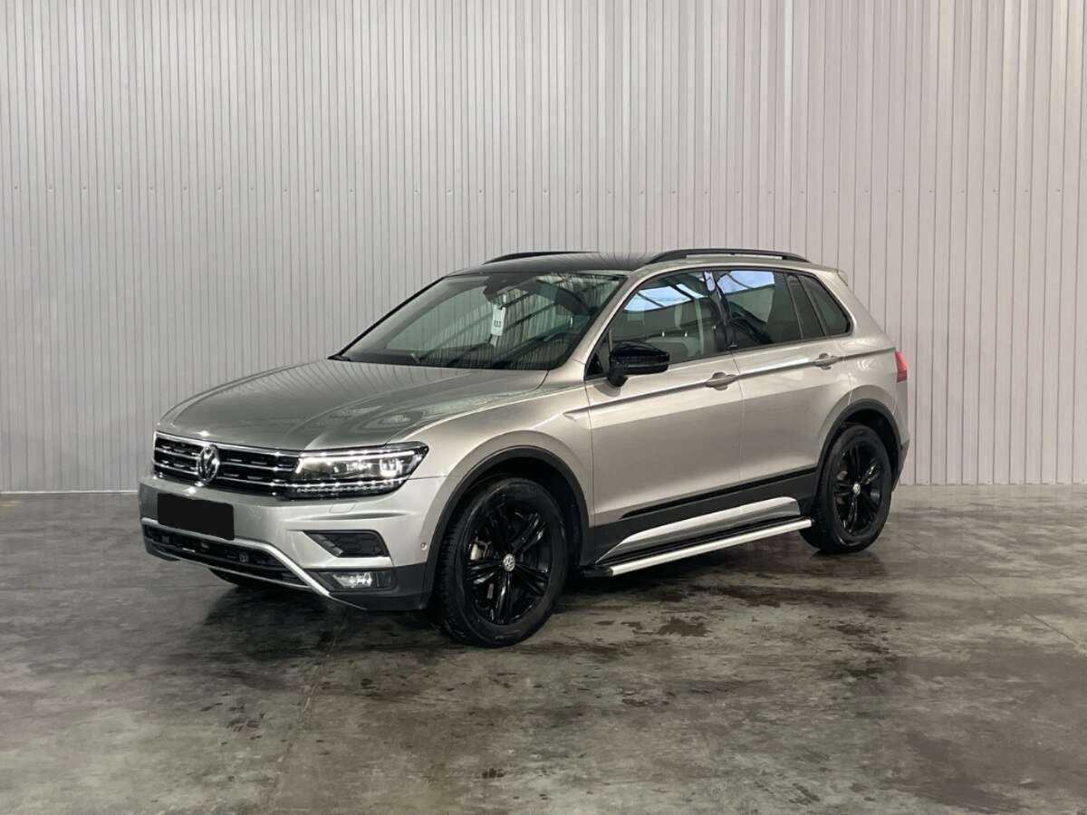 Купить Volkswagen Tiguan с пробегом. Посмотреть фото