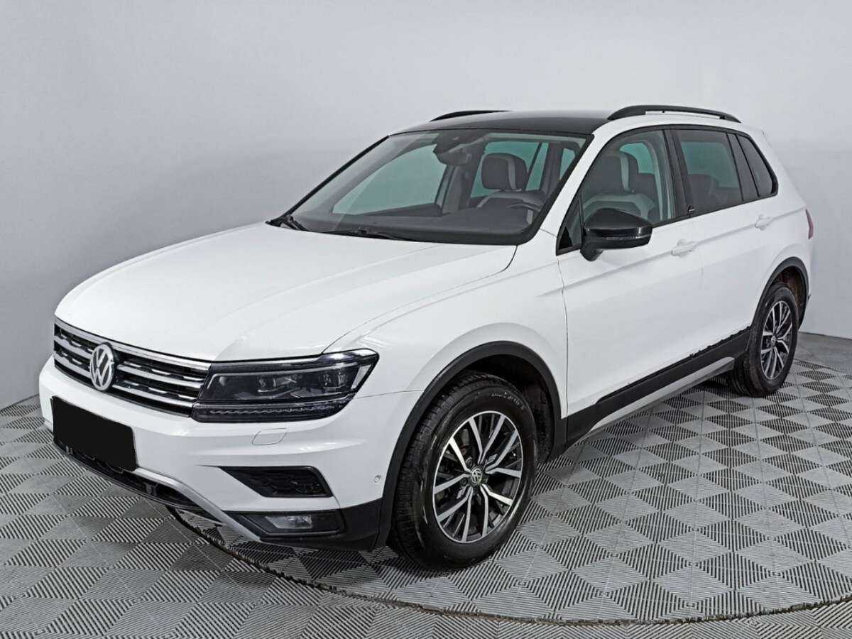 Купить Volkswagen Tiguan с пробегом. Посмотреть фото