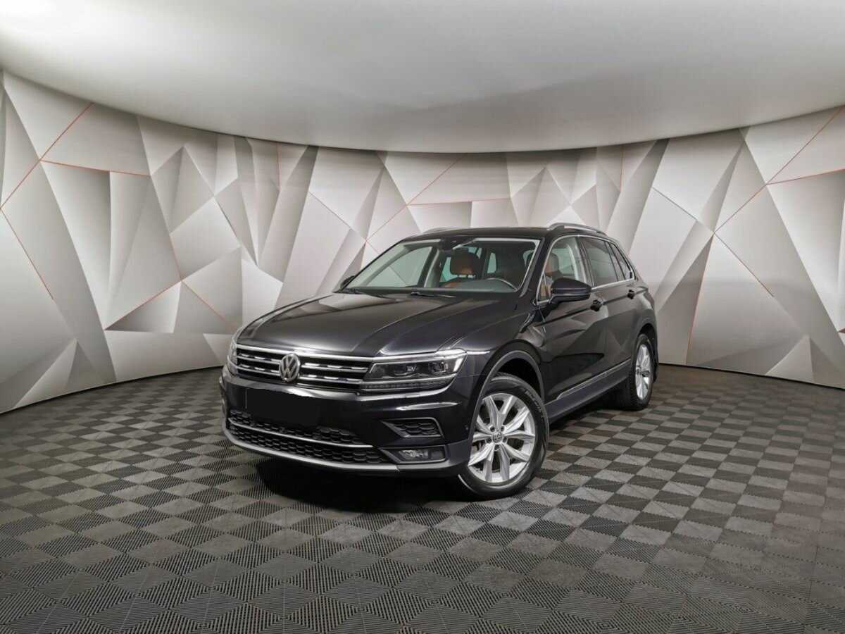 Купить Volkswagen Tiguan с пробегом. Посмотреть фото