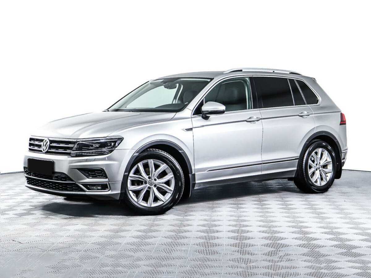 Купить Volkswagen Tiguan с пробегом. Посмотреть фото
