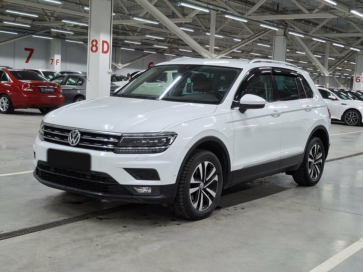 Купить Volkswagen Tiguan с пробегом. Посмотреть фото