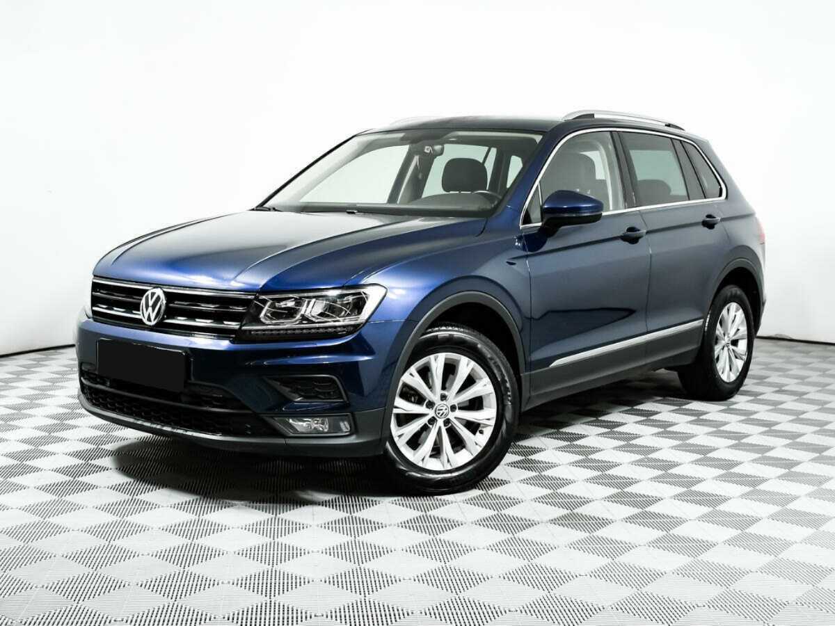 Купить Volkswagen Tiguan с пробегом. Посмотреть фото
