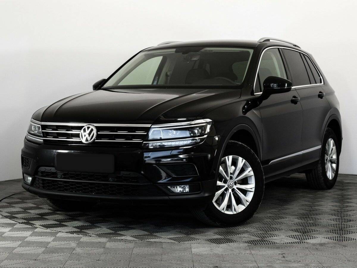 Купить Volkswagen Tiguan с пробегом. Посмотреть фото