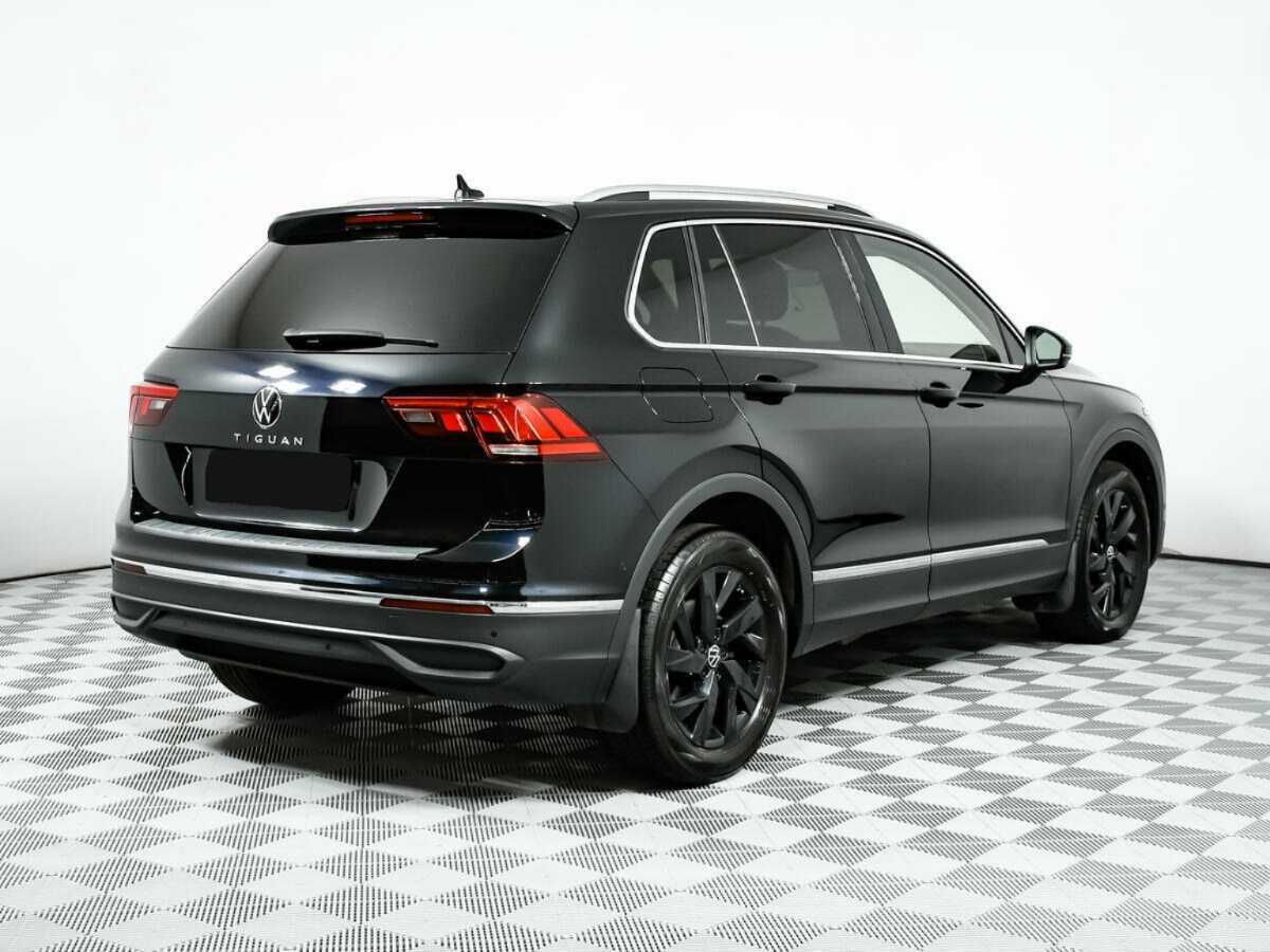 Купить Volkswagen Tiguan с пробегом. Фото: #4