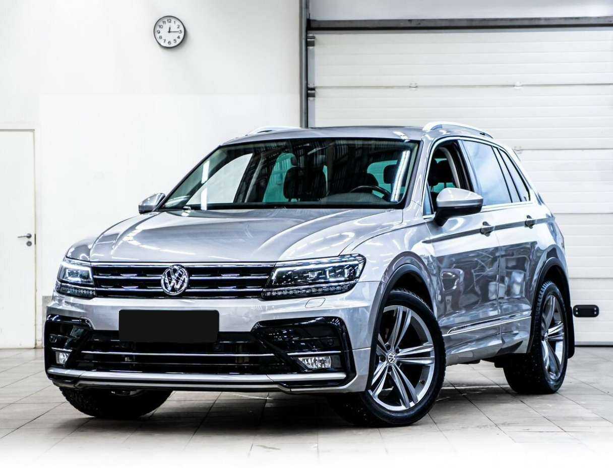 Купить Volkswagen Tiguan с пробегом. Посмотреть фото