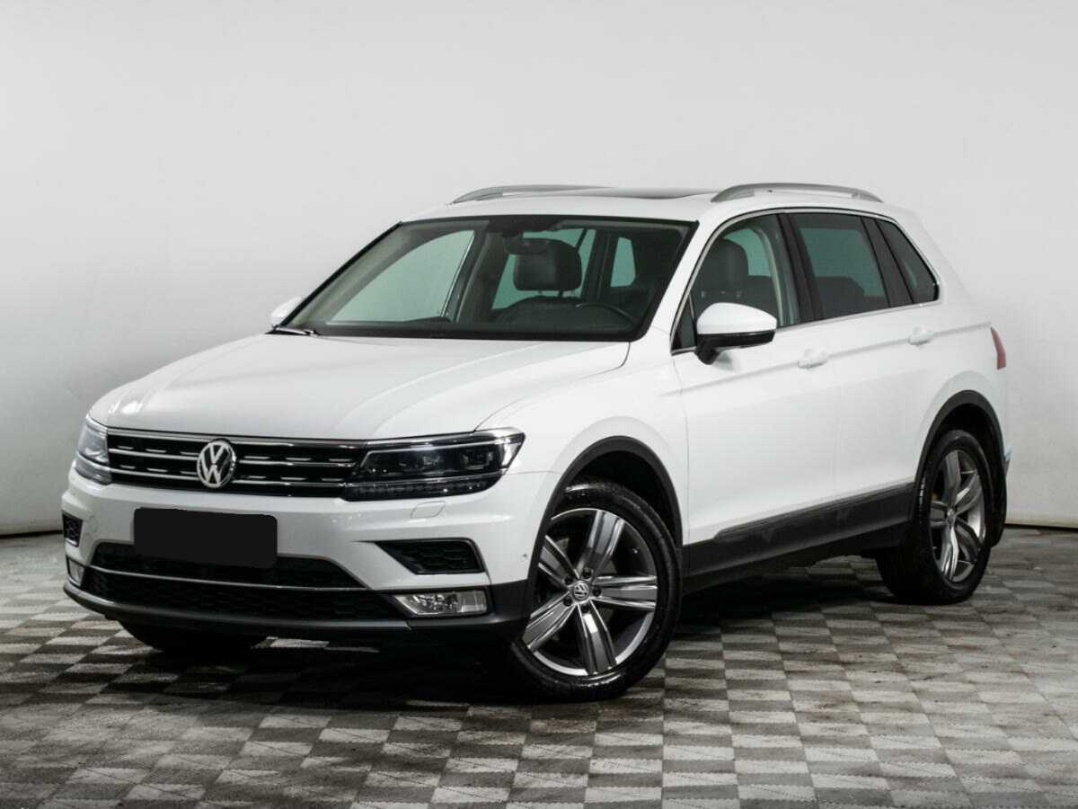 Купить Volkswagen Tiguan с пробегом. Посмотреть фото