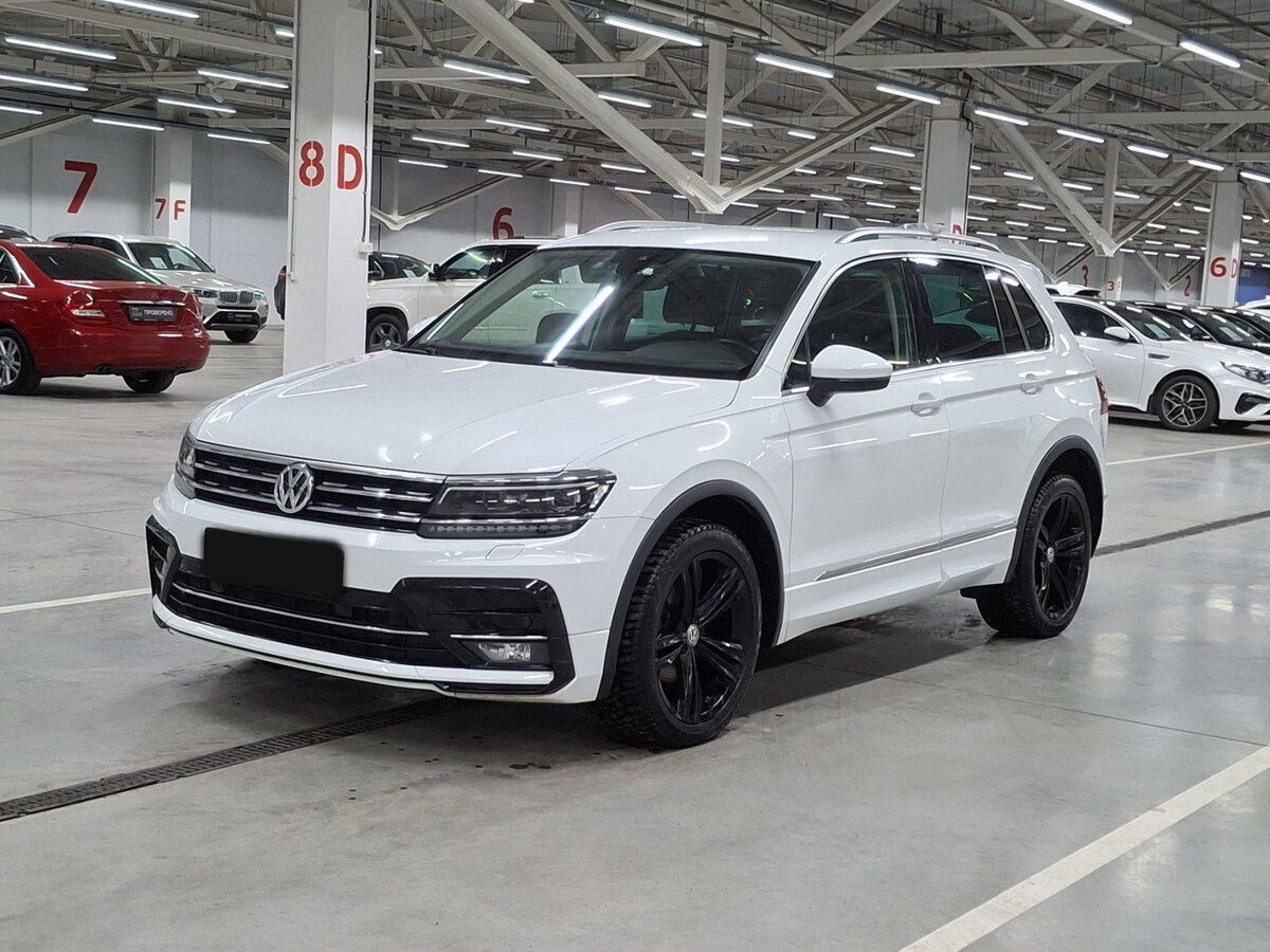 Купить Volkswagen Tiguan с пробегом. Посмотреть фото