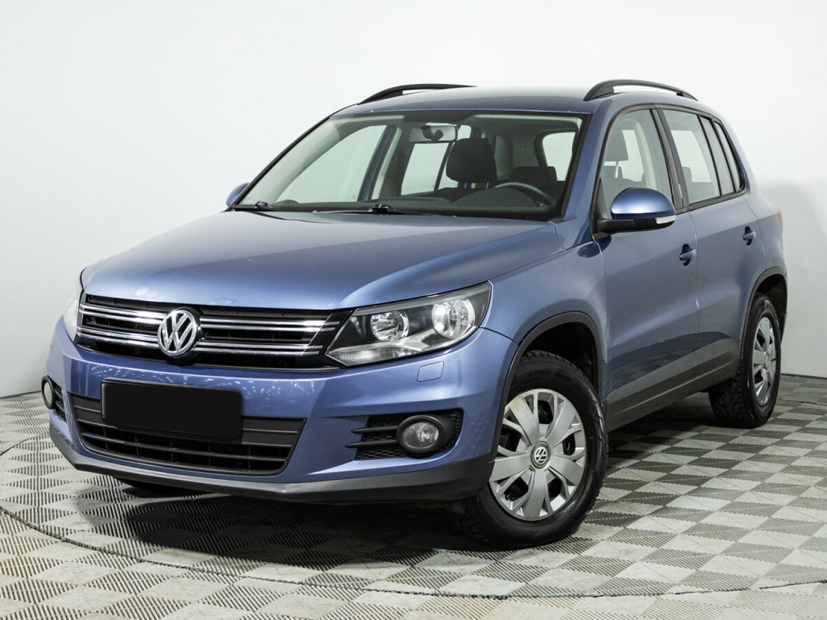Купить Volkswagen Tiguan с пробегом. Посмотреть фото