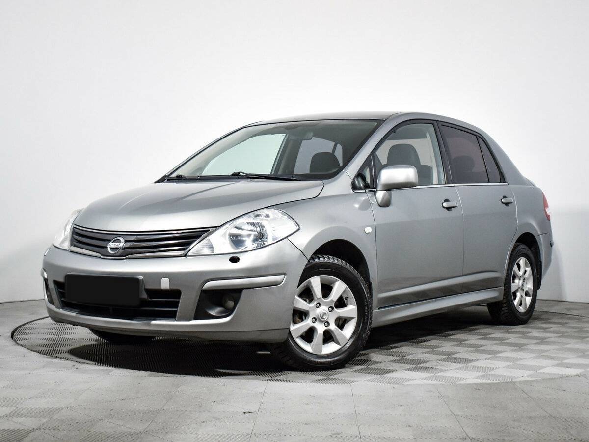Купить Nissan Tiida с пробегом. Посмотреть фото