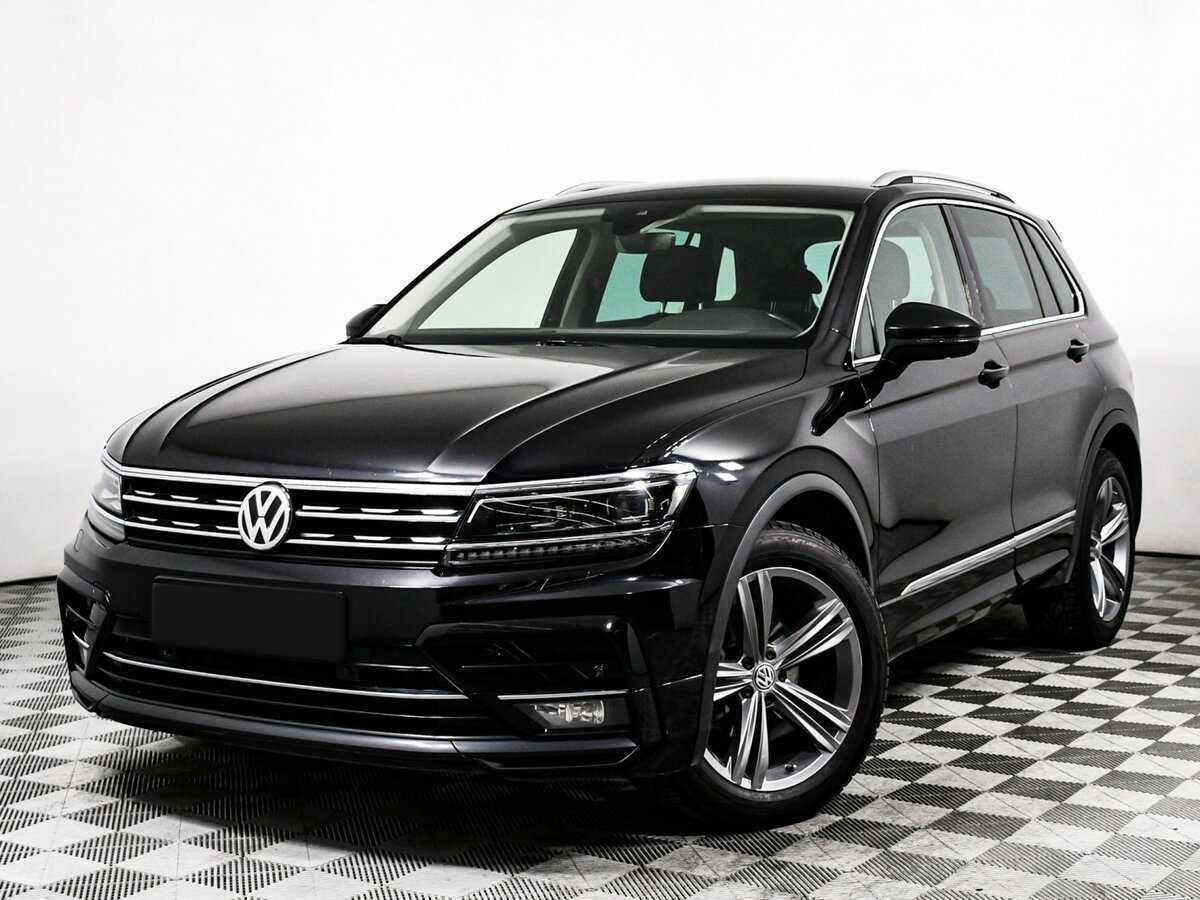 Купить Volkswagen Tiguan с пробегом. Посмотреть фото
