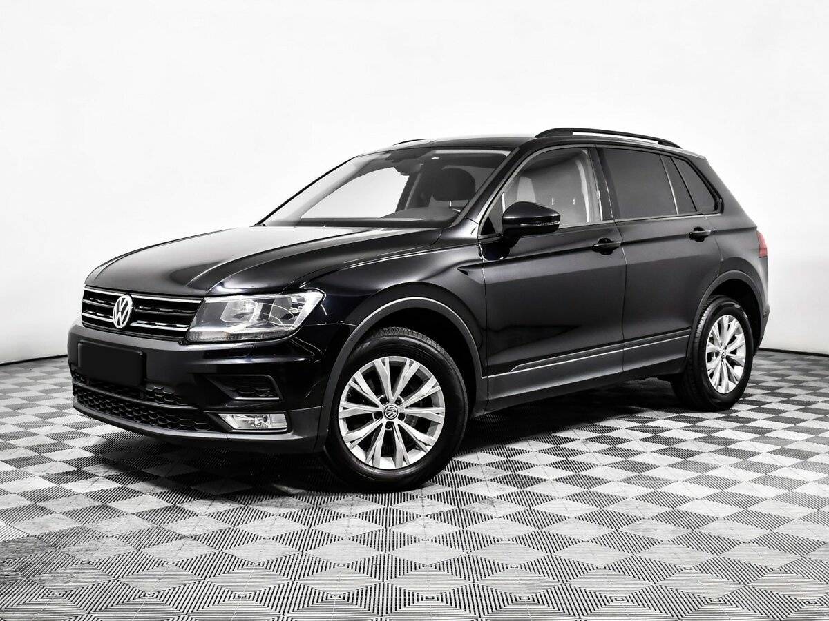 Купить Volkswagen Tiguan с пробегом. Посмотреть фото