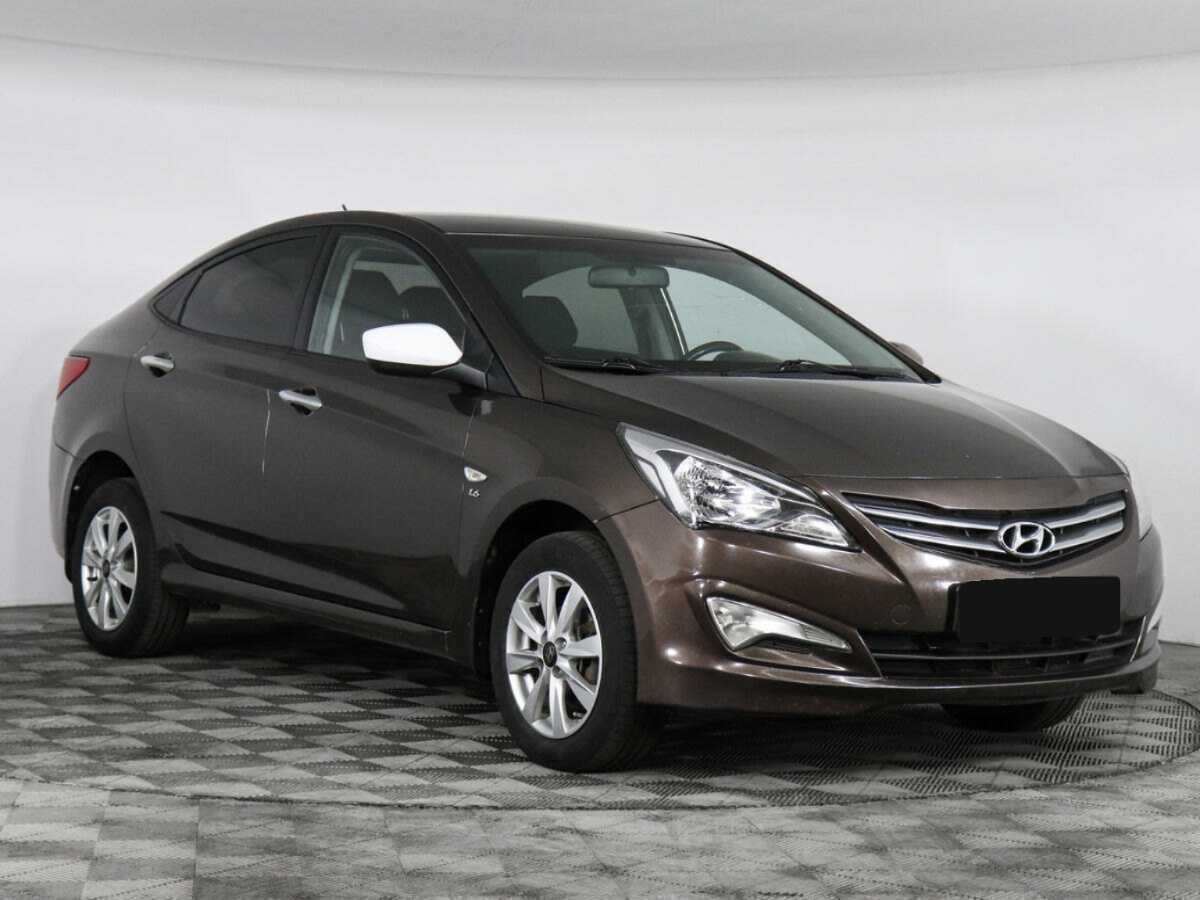 Купить Hyundai Solaris с пробегом. Фото: #2