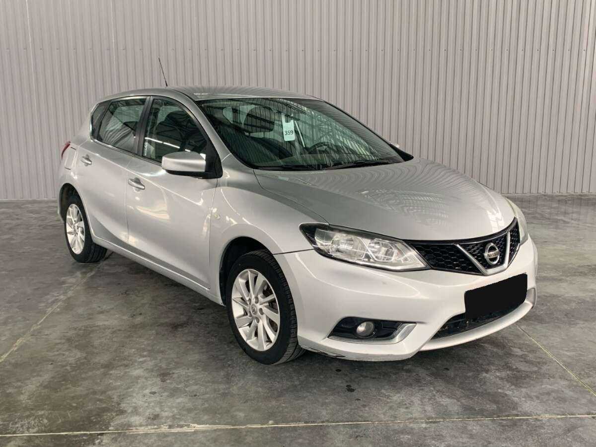 Купить Nissan Tiida с пробегом. Фото: #2