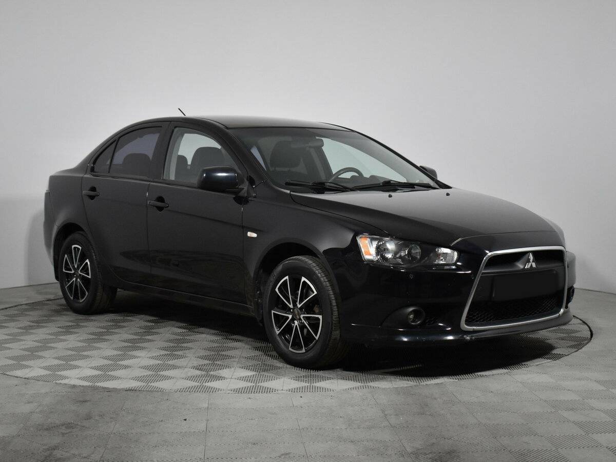 Купить Mitsubishi Lancer с пробегом. Фото: #2