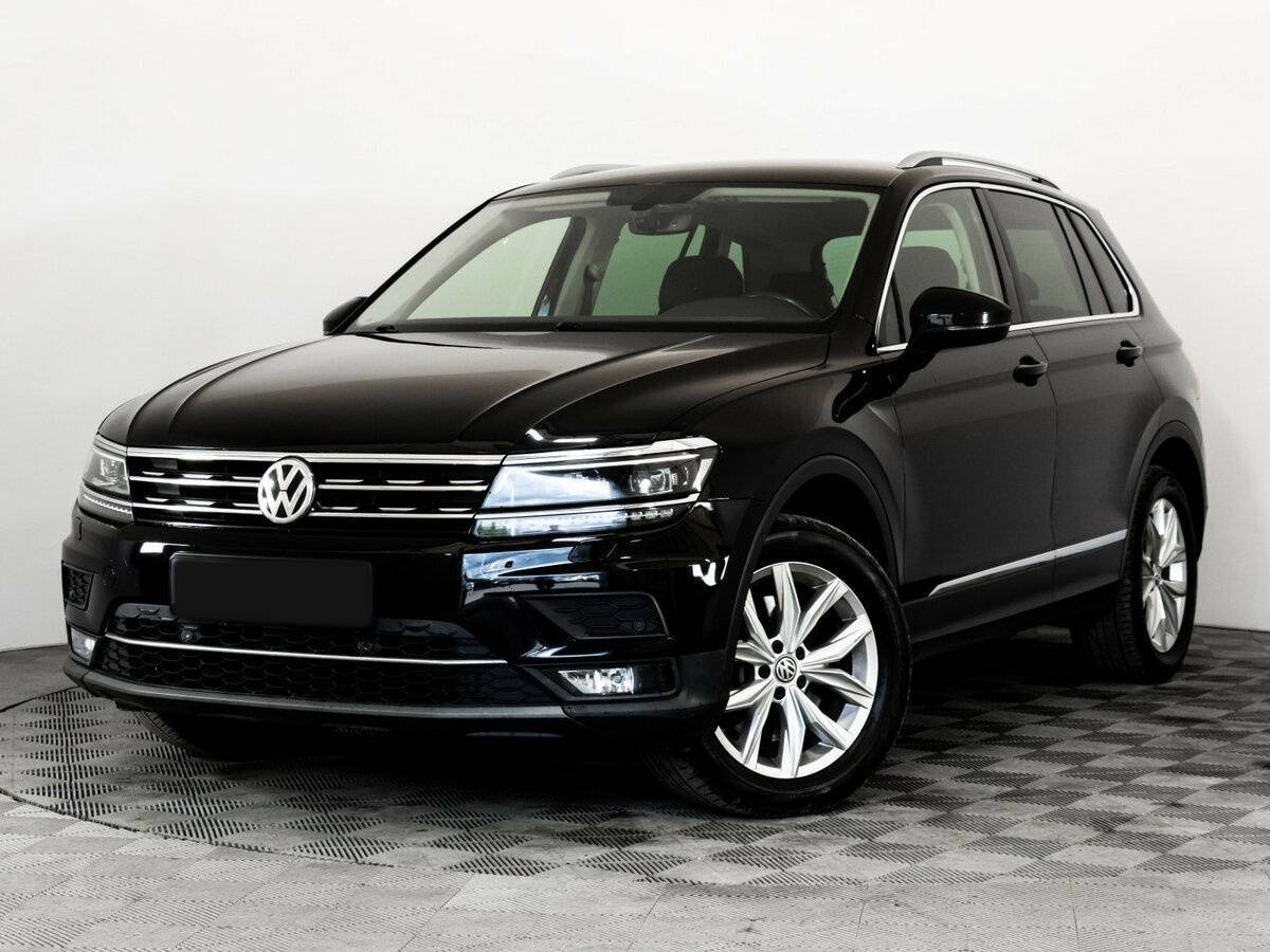Купить Volkswagen Tiguan с пробегом. Посмотреть фото