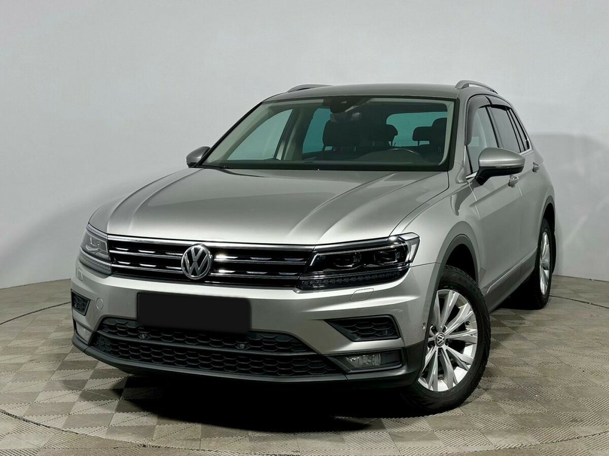 Купить Volkswagen Tiguan с пробегом. Посмотреть фото