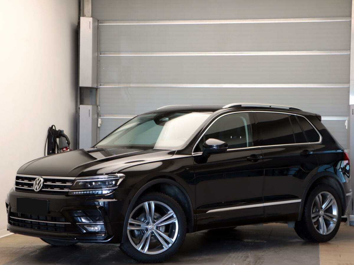 Купить Volkswagen Tiguan с пробегом. Посмотреть фото
